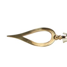 Toppemblem av mässing