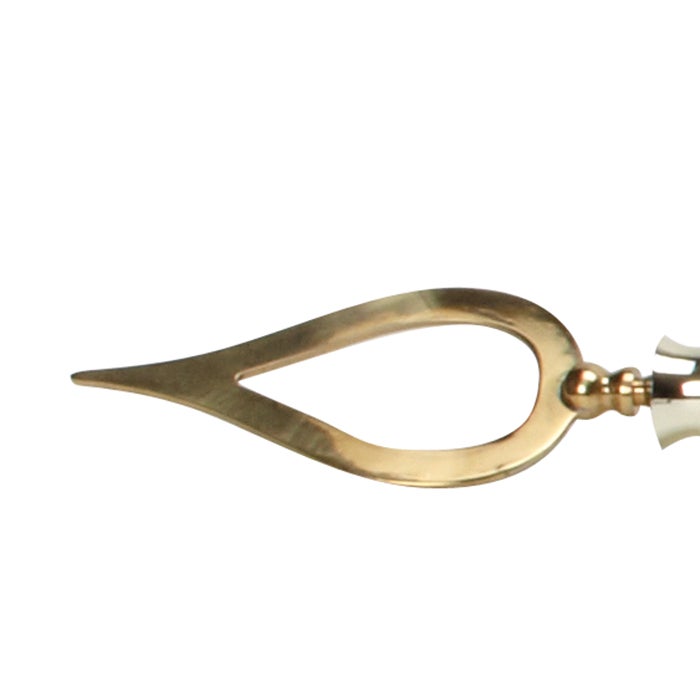 Toppemblem av mässing