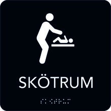 Taktil skylt Skötrum 150x150 mm, Svart med vit text