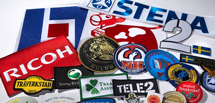 Broderade tygmärken